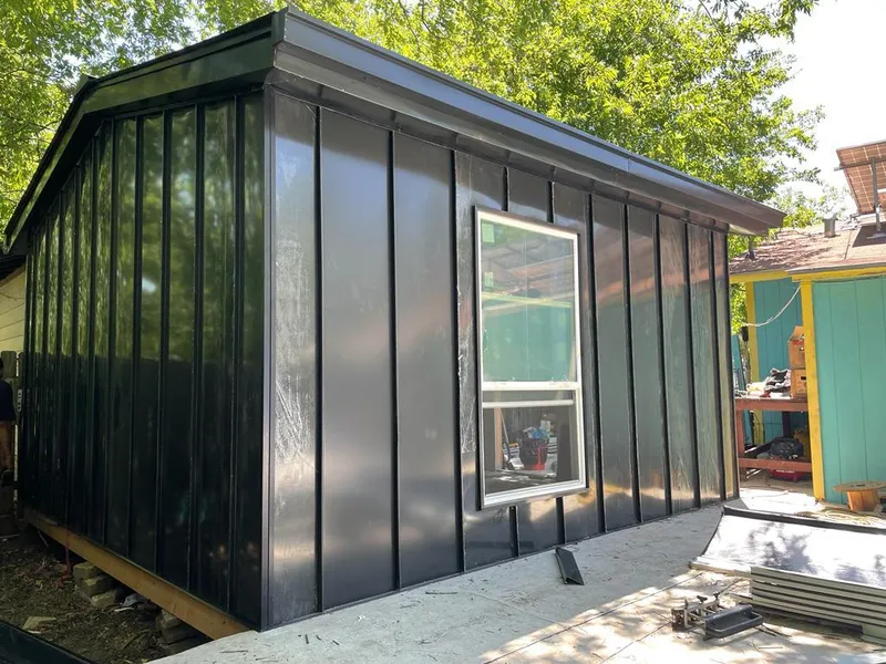 Black standing seam metal wall panels for Metal Roof Installation in Warren